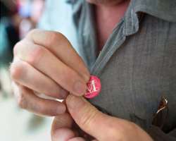 There was a metal button that was to be attached t There was a metal button that was to be attached to the shirts of the visitors for entry into the museum after taking tickets. But after 2013, due to